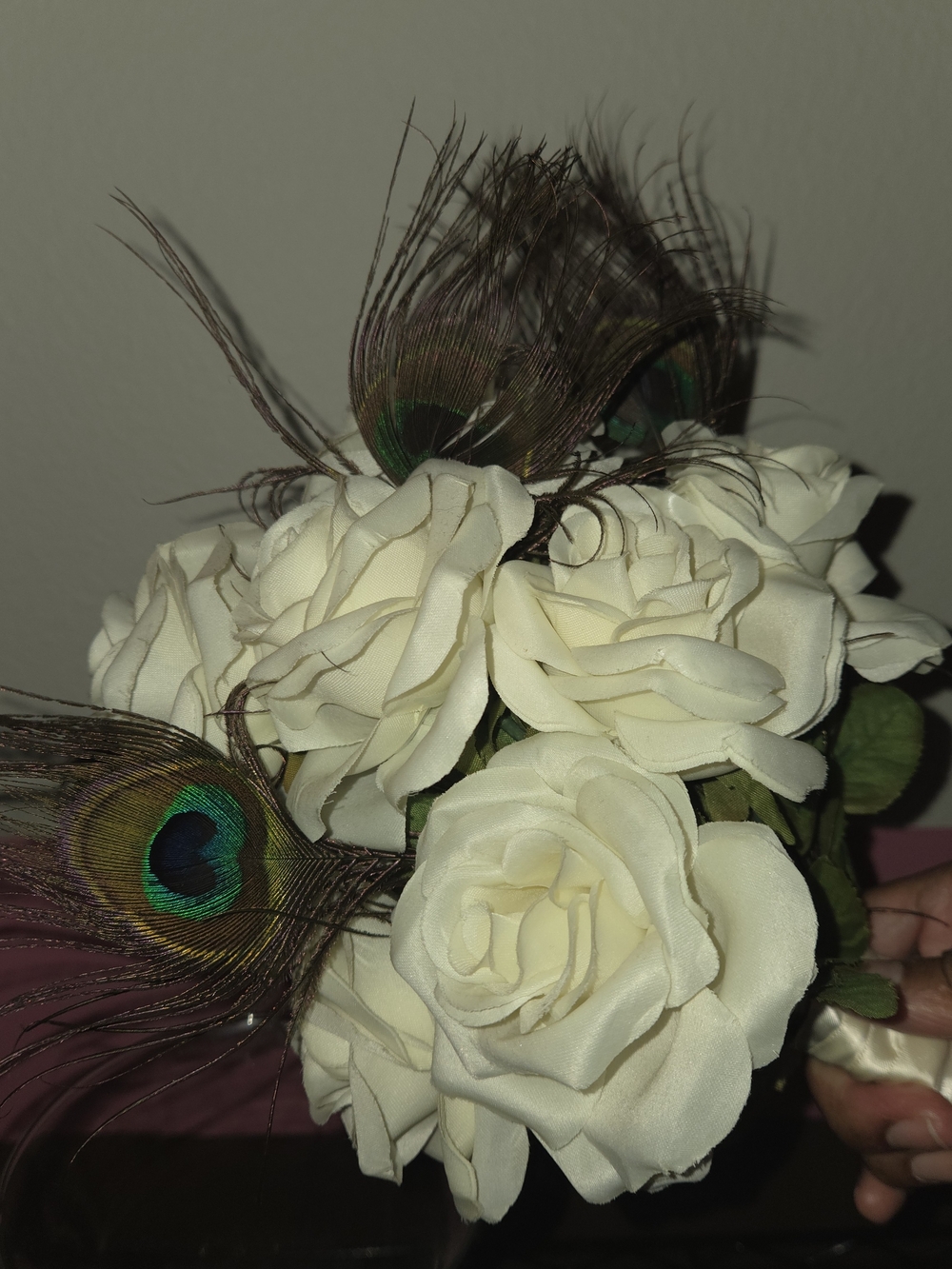 Elegant Ivory Rose Bouquet with Peacock Feather Accents